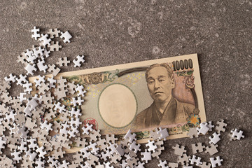 Jigsaw puzzle and Japanese money