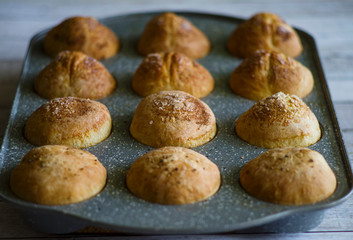 Homemade baking . Buns laid on a baking sheet