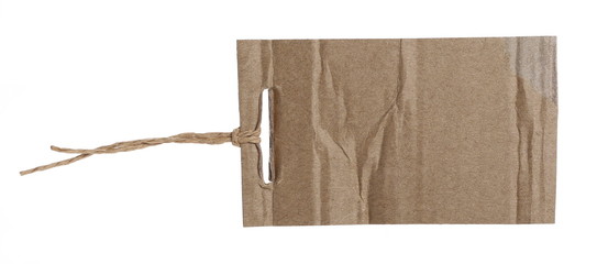 Blank and empty cardboard price tag tied with string isolated on white background with clipping path
