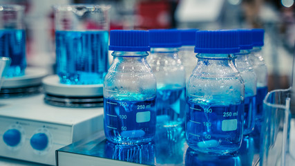 Testing Blue Solution In Science Laboratory