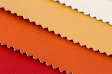 Multi-colored samples, flaps of artificial leather. Materials for sewing and needlework.