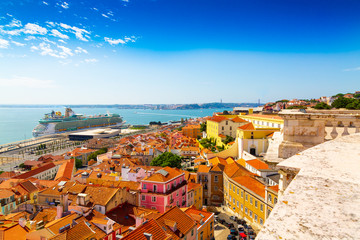 Panorama of historical Alfama district and Tagus River view from National Panteon in Lisbon city,...