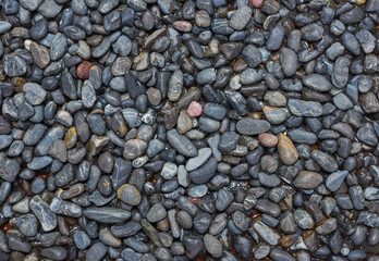 Black Dark Pebbles For Background or Texture Moody Wet Stone surface gloomy
abstract muted colors