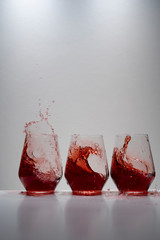 juice splash in a drinking glass