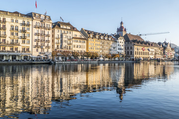 Lucerne reflected in the water in a sunny day