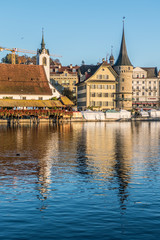 Obraz premium Lucerne reflected in the water in a sunny day