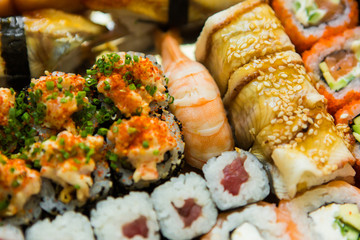set of sushi and rolls. delicious japanese traditional food. Fish menu. assorted seafood