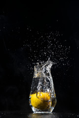 lemon water splash in a drinking glas