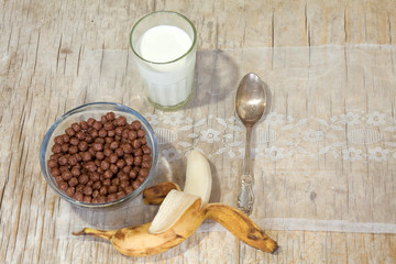 Breakfast milk with cereal and banana