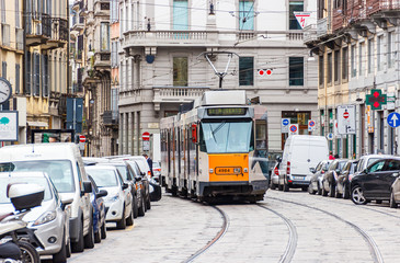 The daily life of the city of Milan. Trip tram goes along Cusani street in Milan, Italy.