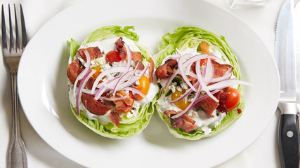A classic bacon and blue cheese wedge salad