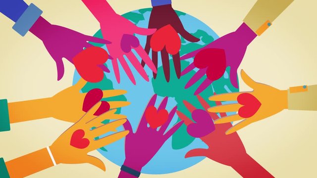 Hands holding a heart. People from different countries collaborating together to work in a volunteer team,  love concept.