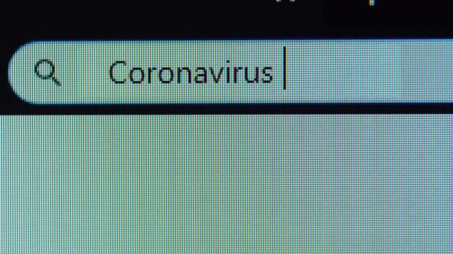 Browser tab with Coronavirus vaccine text typed on the computer monitor. Shot in 4k resolution