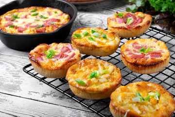 Belarusian pie, Smazhenka, with sausage, egg and topped with green onion
