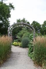 WALK WAY INTO A GARDEN ON A SUMMER DAY, GREEN PLANTS, 