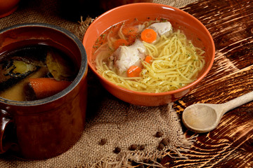 Chicken broth cooked with burnt onion in a clay pot