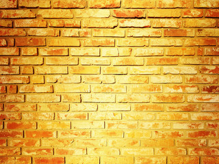Vintage brick wall texture background yellow color