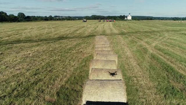 Span on a quadrocopter over haystask.Agriculture. Aerial view. From above.