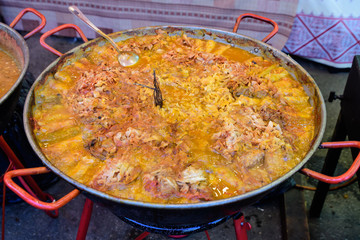 Freshly cooked large portion of cabbage rolls with meat and cabbage, a traditional Romanian food called sarmale cooked at a food market
