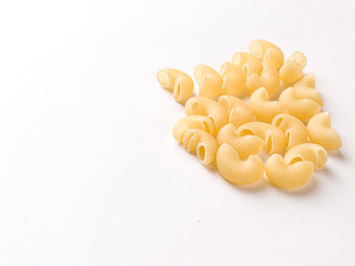 Uncooked macaroni elbow shape pasta with white background stock image. 