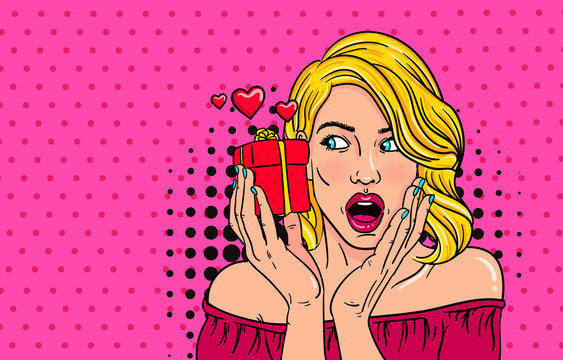 Wow pop art face of surprised fashion girl open mouth with Valentine Present in hand. Love. Beautiful young woman model pointing hand, advertising gesture. 