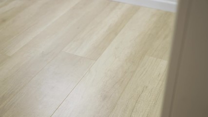 Food delivery paper bag sitting outside door - hand with latex glove picks it up