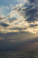 Amazing sea sunset, the sun, waves, clouds