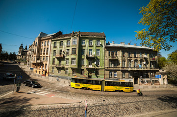 Fototapeta premium A tram rides through the old town