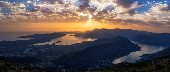Beautiful, summer sunset over the Bay of Kotor (also known simply as Boka ("the Bay")  - the winding bay of the Adriatic Sea in southwestern Montenegro. View from the Lovcen mountains.