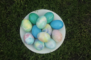 Multi-colored Easter eggs on a plate