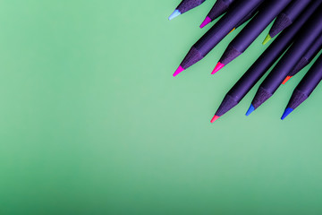 Color pencils of various color on a white background