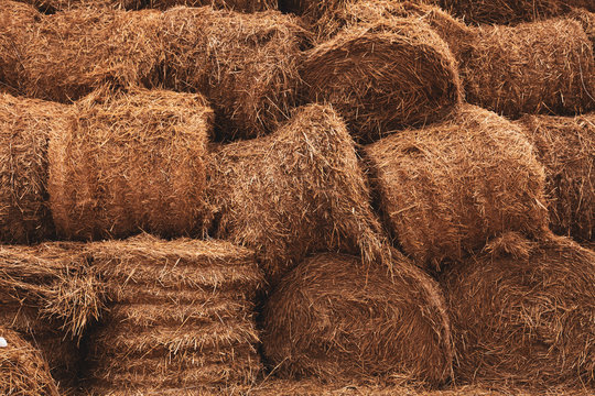 Stacked Straw Hay Bails Background