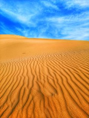 Fototapeta na wymiar Sand dunes waves in desert
