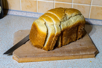 Home prepared vegetarian bread on wood board