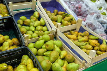 pears in boxes for sale in a supermarket