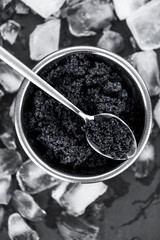 Slate slab with Black Caviar (selective focus; close-up shot)