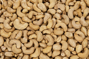 Background image of many fresh cashew nuts