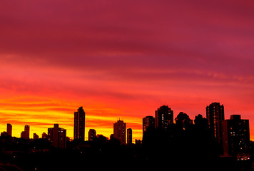 City Skyline With Beautiful Vivid Colorful Skies At Sunset Sunrise Silhouette