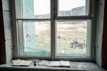 view from the broken school window in the village of Teriberka on the coast of the Barents Sea