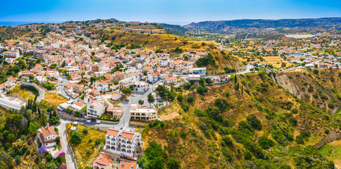 Cyprus. Resort Pissouri. Pissouri top view. Pissouri village among the hills. Cruise on the islands of the Mediterranean. Traveling. Panorama of the Cyprus resort. Holidays in Cyprus.