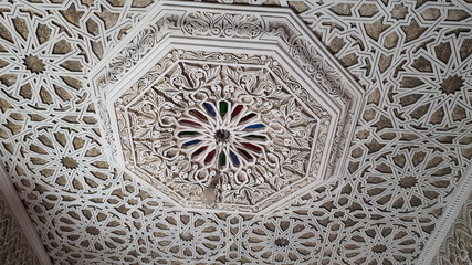 Morocco, Marrakech, detail of the ceiling of a mosque. Arabic marbles