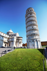 Pisa Cathedral By Leaning Tower Against Clear Blue Sky