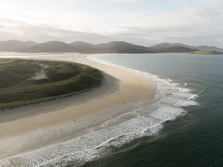 Aerial drone photo of Traigh Rosamol point at Luskentyre beach on the western coast of the Isle of Harris in Scotland. Lovely sunny day.