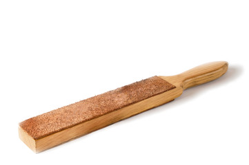 Straight razor strap on wooden handle isolated on white