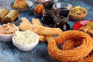 Middle eastern or arabic dishes. Turkish Dessert Baklava with pistachio. Halal food.