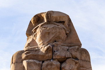 Colossi of Memnon are two massive stone statues Pharaoh Amenhotep III, who reigned in Egypt during the Dynasty XVIII.