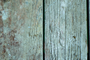 Wooden wall background in a morning light. With shadows from a window frame.