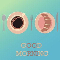 Un café y un croissant para desayunar 