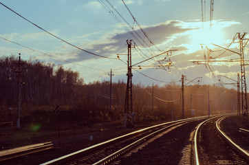 Railroad tracks at sunset. Vanishing point.