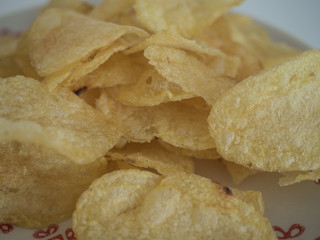 Plate of fried potatoes with olive oil